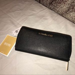 Michael Kors wallet, genuine soft leather.